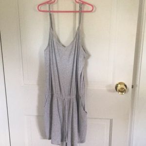 Grey and white striped romper. Two big pockets!
